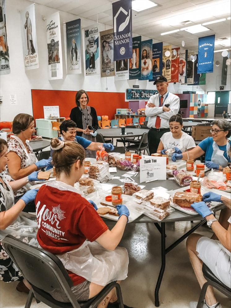 Volunteers making sandwiches