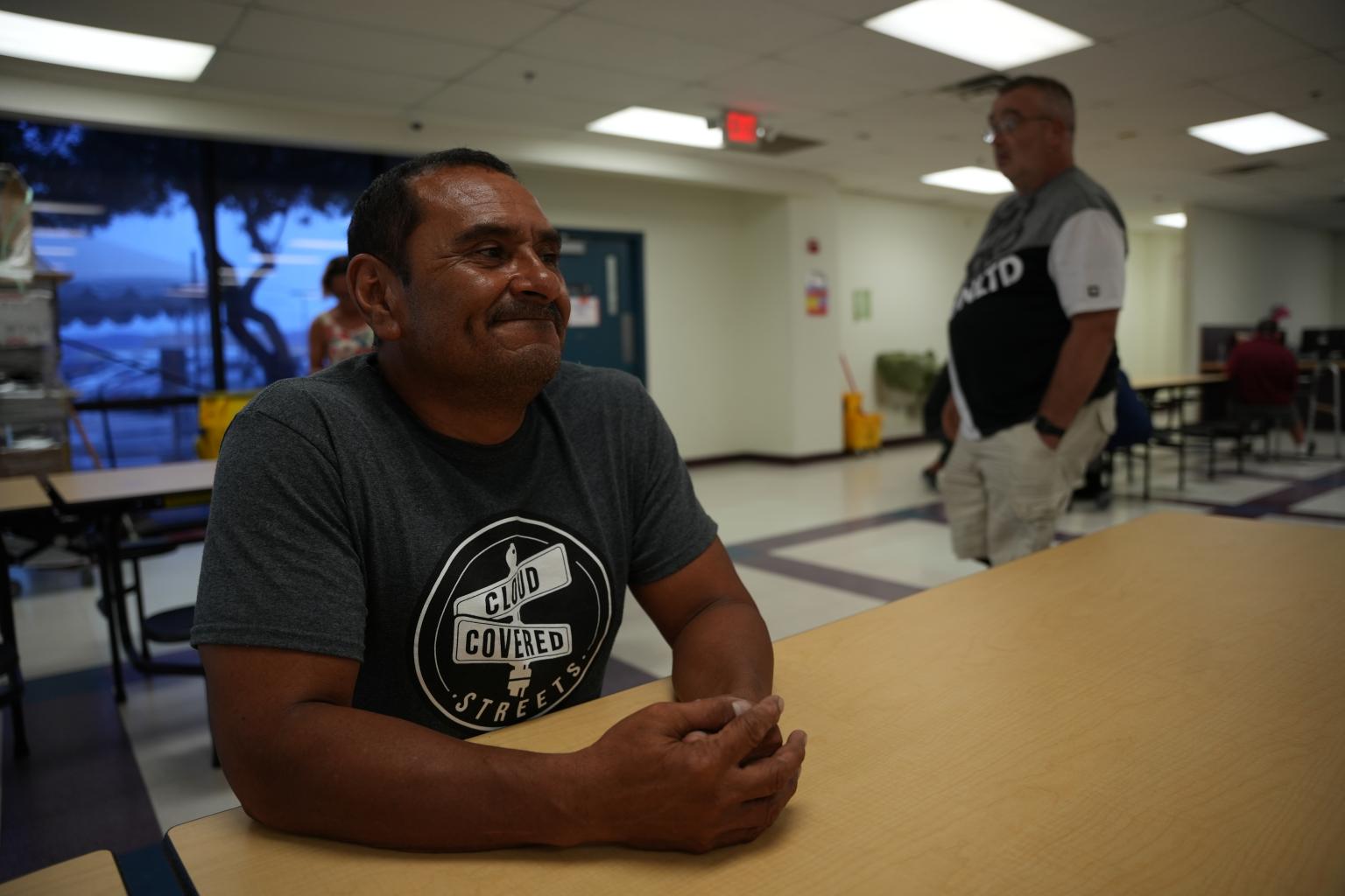 Frank sits in the dining area at the Washington Street Shelter. 