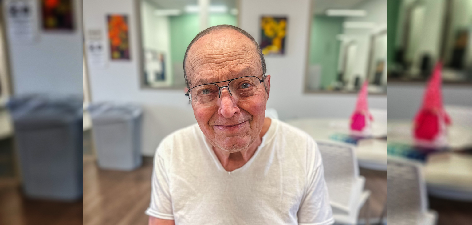 James Mann poses for a portrait after dying his hair.