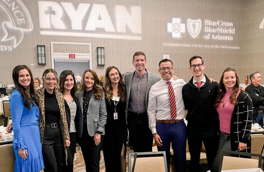 Group of young professionals posing together