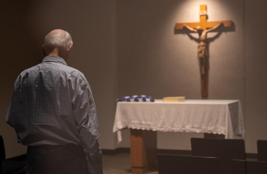 Michael Hefferman prays in the Oz Chapel