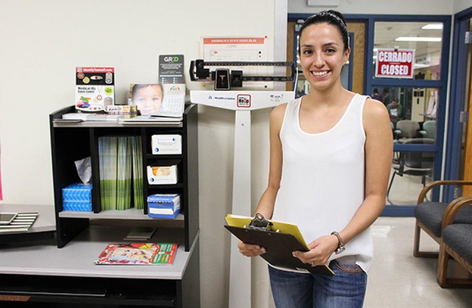 Elvia Madrid poses for a photo in St. Vincent de Paul's Family Wellness Program.