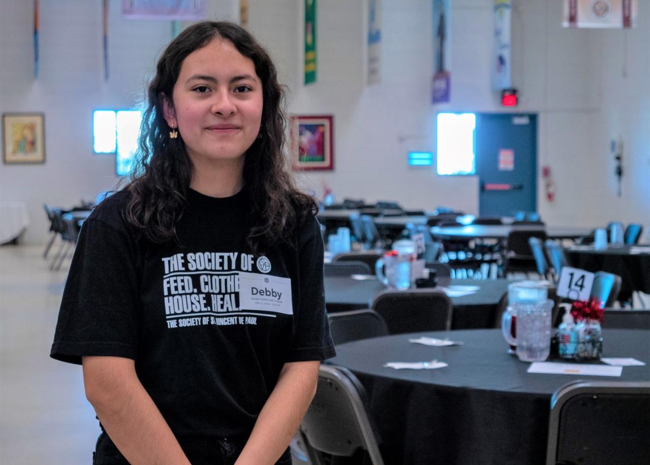 Debby Suarez posing in the SVdP Family Dining Room