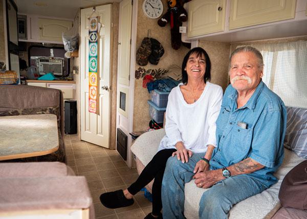 Man and woman sitting on a couch