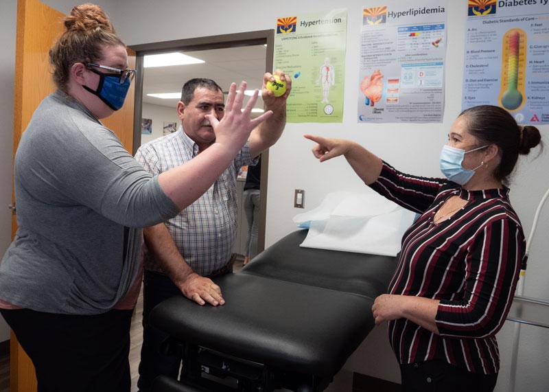 Hermila joins Ernesto's PT sessions, helping motivate him.