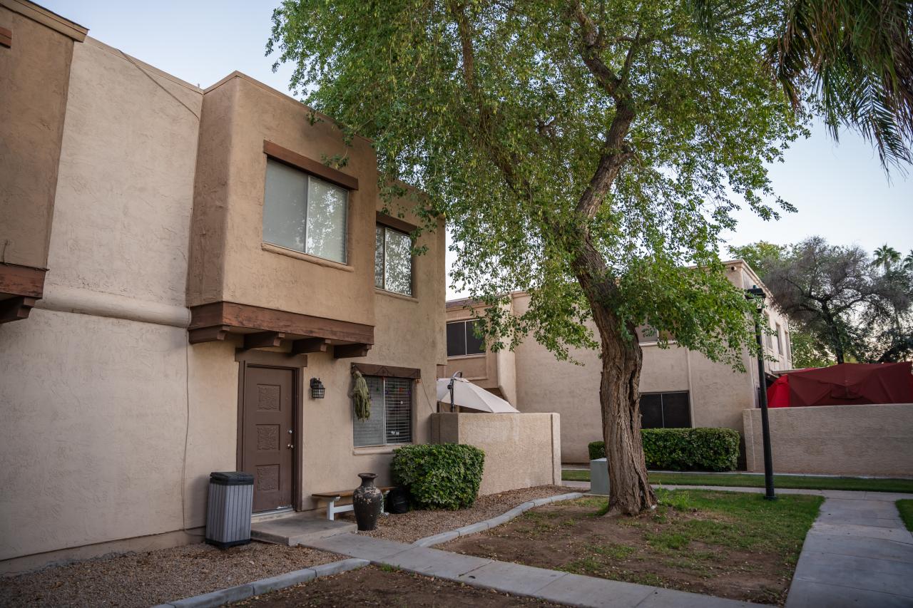 A wide view of the exterior of Jesse's apartment.