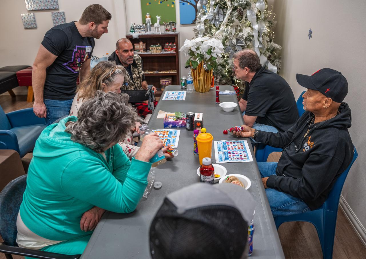 A group of guests eye each other as the game of BINGO intensifies.