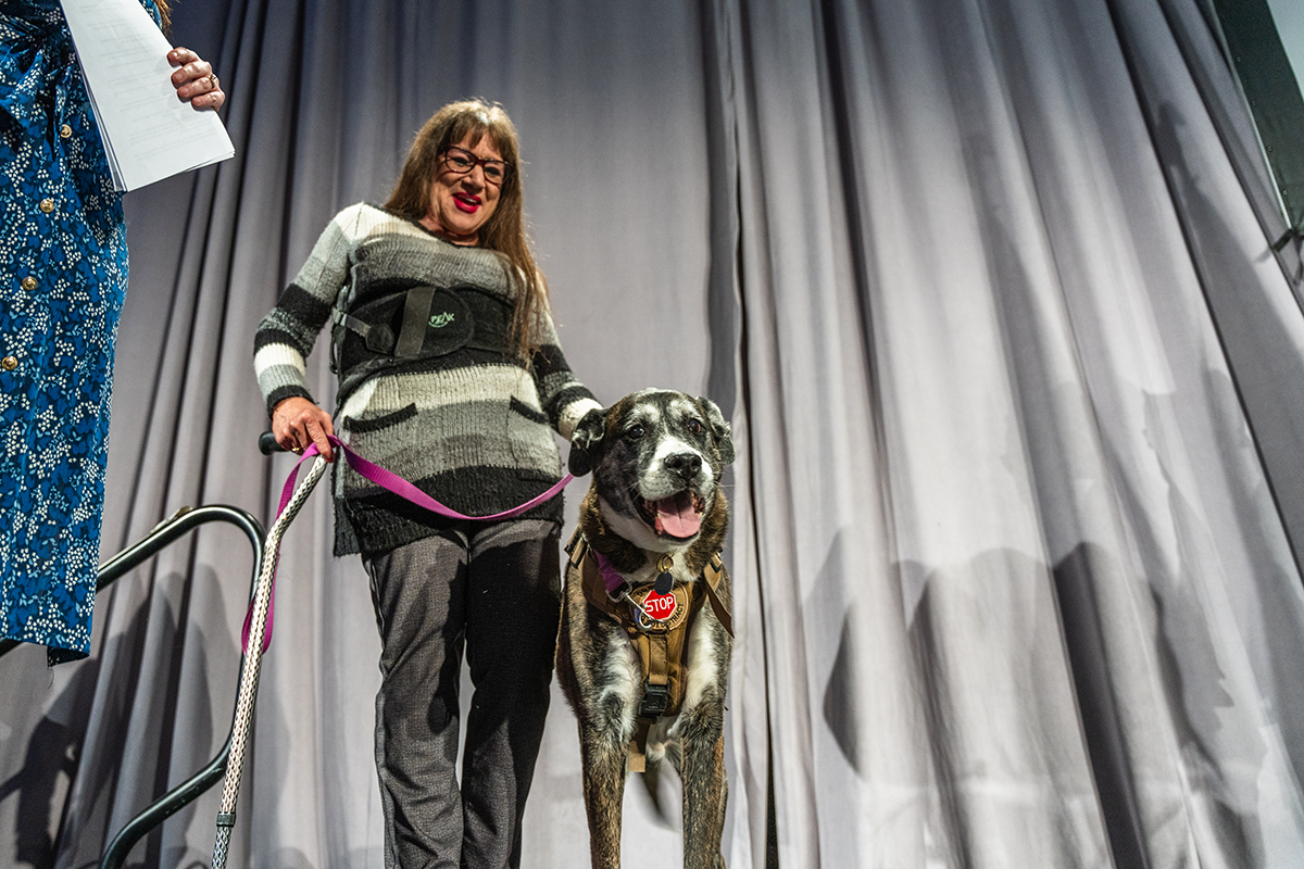 Interim Housing Graduate DD Brown and her dog Cocoa 